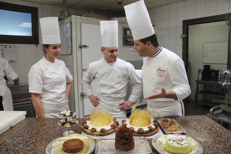 chef Christophe Muller with a selection of desserts